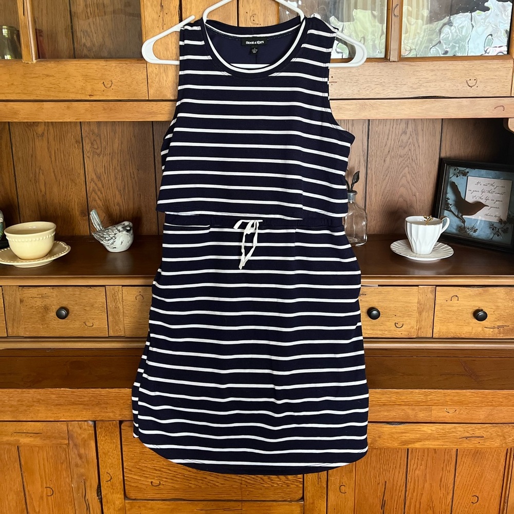 Never worn Sleeveless jersey dress with elastic waist, can be casual /dressed up